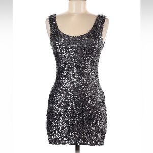 Silver sparkle mini dress. Body con style, stretchy material. Size M in junior.